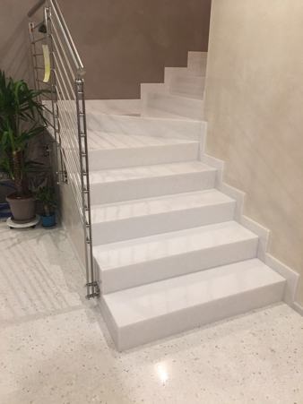 Staircases in marble granite and natural stone